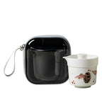 White porcelain guppy travel tea set with lidded brewer, cup and black zip case