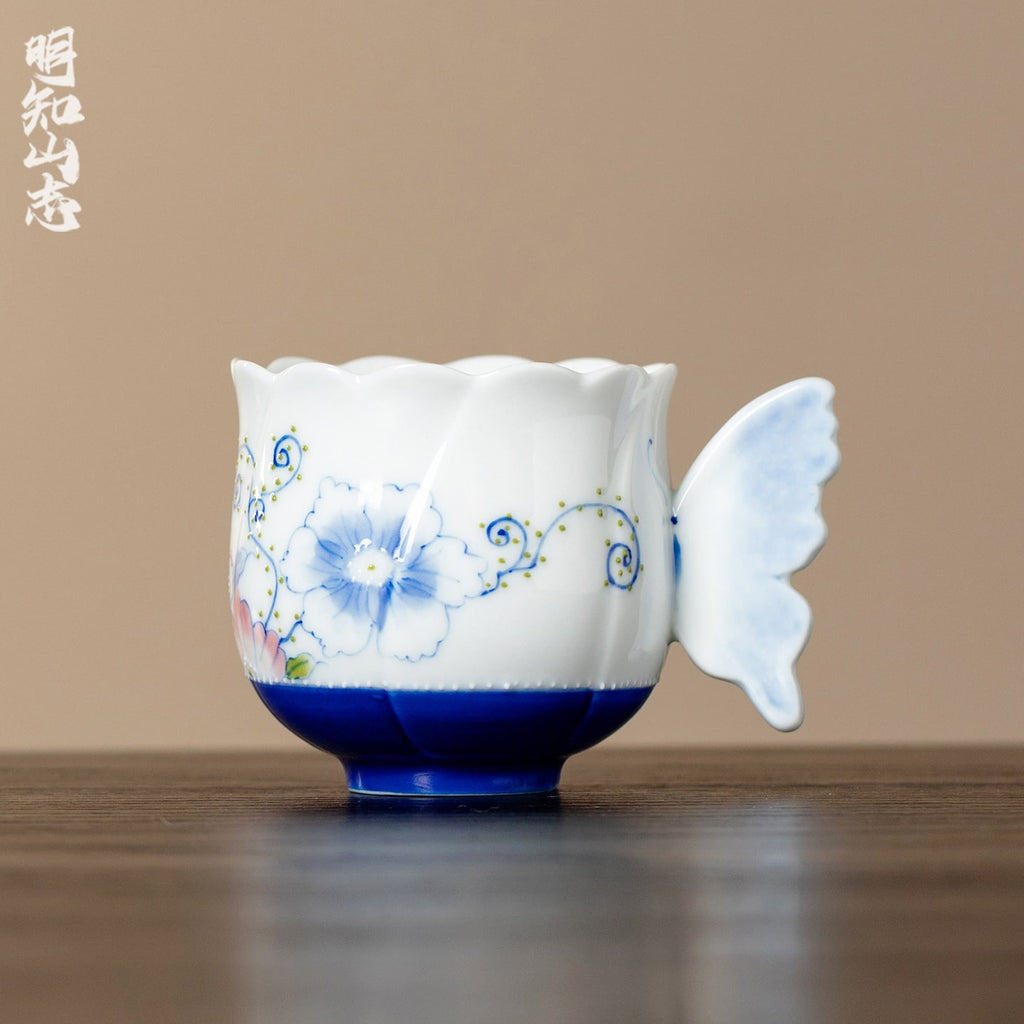 Ivory Clay Blue Floral Tale Butterfly Handle Tasting Cup — view 2