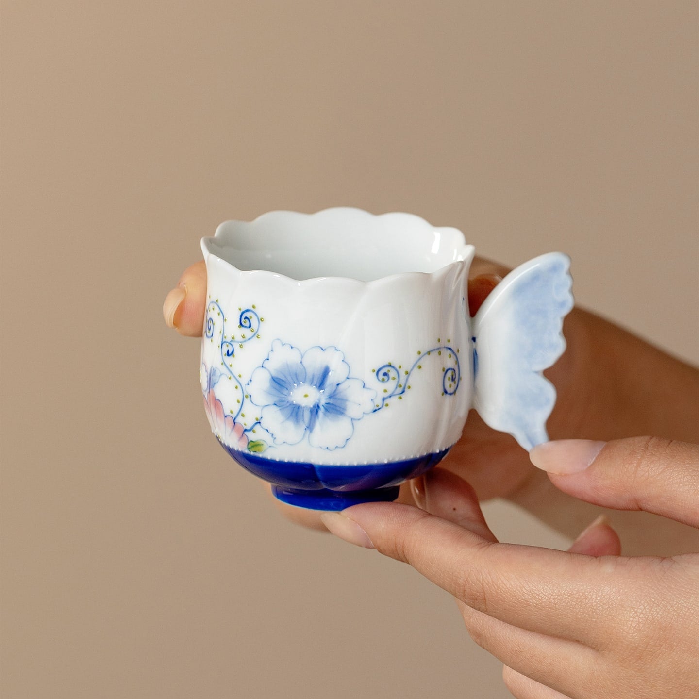 Ivory Clay Blue Floral Tale Butterfly Handle Tasting Cup — view 3