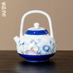 Ivory Clay Blue Floral Tale Palace Lantern Bail-Handle Teapot — view 2