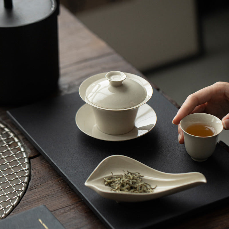 Wood Ash Four-Sunset Gaiwan on a contemporary gongfu tea table