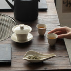 Wood Ash Four-Sunset Gaiwan in a quiet tea session