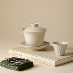 Wood Ash Nafu Gaiwan with saucer on a quiet tea table