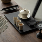 Wood Ash Zhixiao Tasting Cups on a gongfu tea table